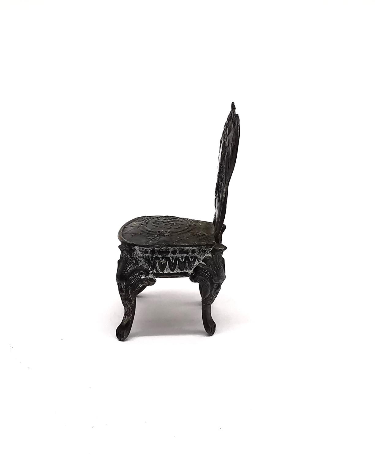 Three silver miniatures to include a repousse chair by John George Piddington, a white metal - Image 8 of 10