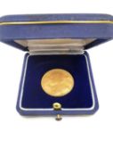 A silk cased 20F Swiss gold coin dated 1947. Diameter 2.1cm Weight 6.44g.