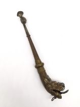 A 19th century brass Tibetan Kangling dragon horn. L.40cm.