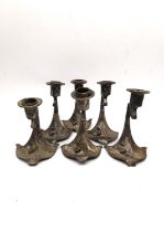 A collection of Six WMF Art Nouveau silver plated desk candlesticks with relief pine cone and leaf