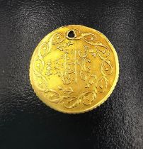 A Turkish 1 cedid gold coin, Mahmud II (1808-1839). (holed) Diameter 2cm. Weight 1.52g.