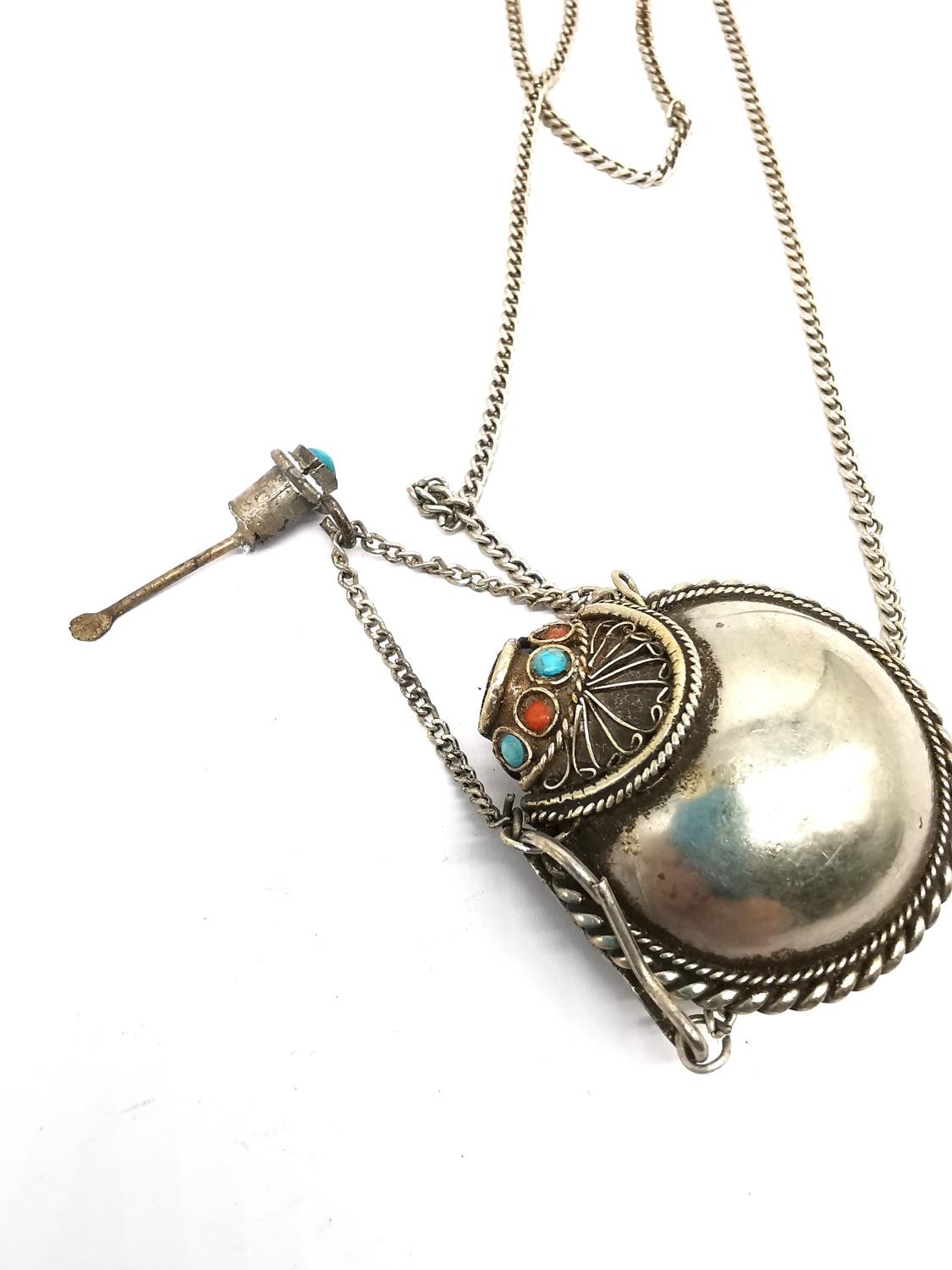 A white metal perfume flask with coral and turquoise detailing on chain, a locket containing plaited - Image 2 of 6