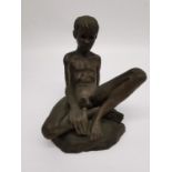 Neil Godfrey, British, b.1937, a bronzed resin seated nude of a young man. Signed and dated 1985.