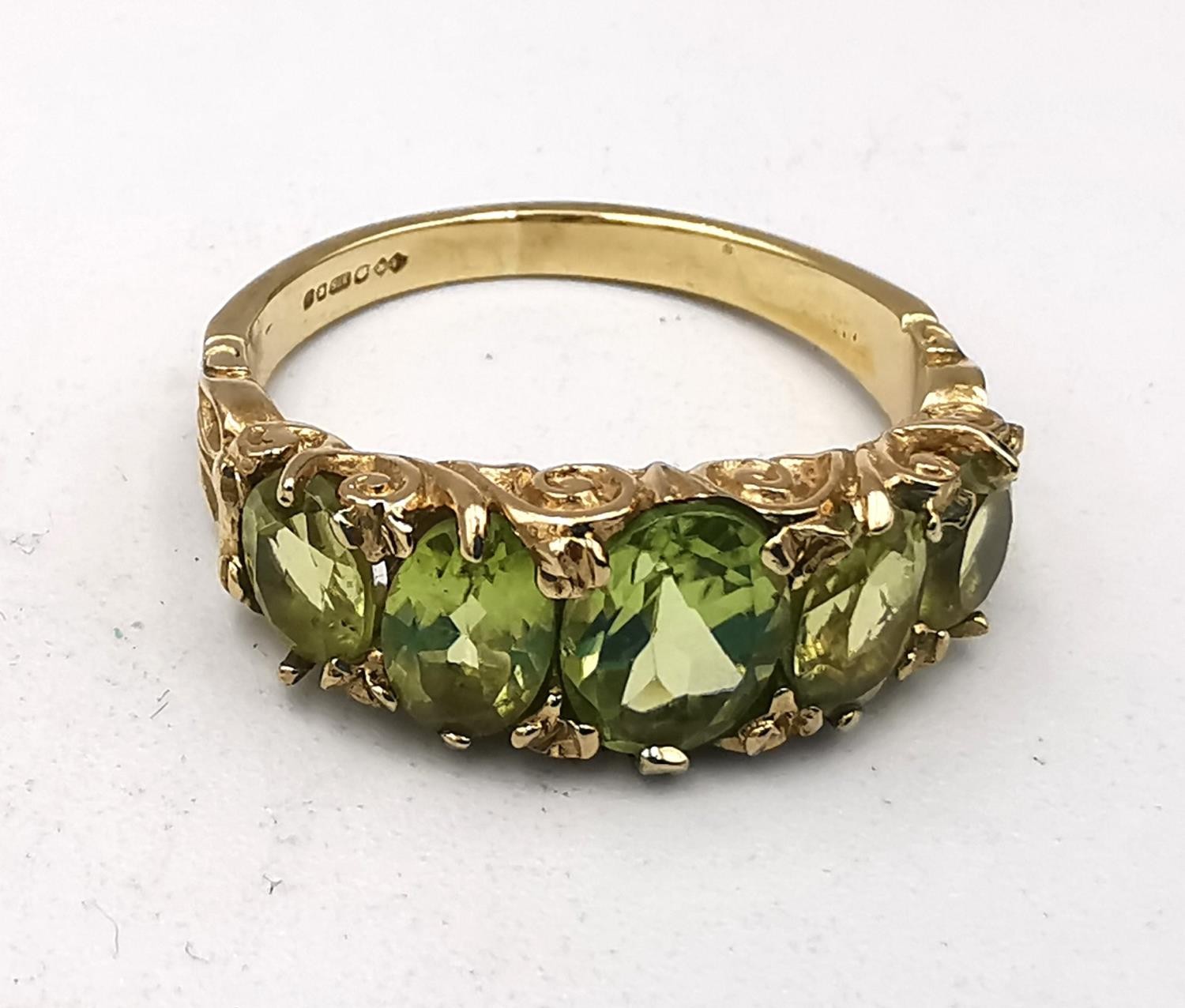 Three vintage 9ct yellow gold gem set rings, a Victorian style carved half hoop peridot set ring - Image 2 of 10