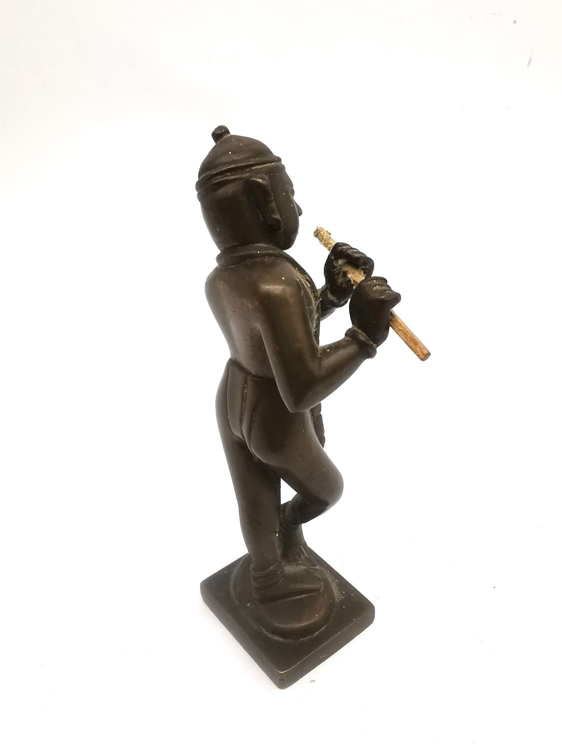 A 19th century Indian bronze figure of Krishna in Tri-bhang stance and playing the flute. H.12.5cm. - Image 5 of 8