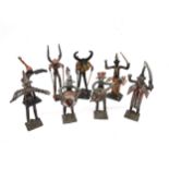 Eight vintage Akan Ashanti painted metal tribal figures of musicians. Tallest 17cm.