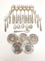 A collection of Persian engraved silver, including six silver teaspoon, twelve silver sauce spoons