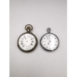 A Victorian white metal Remontoir 10 rubis pocket watch with white enamel dial and black roman