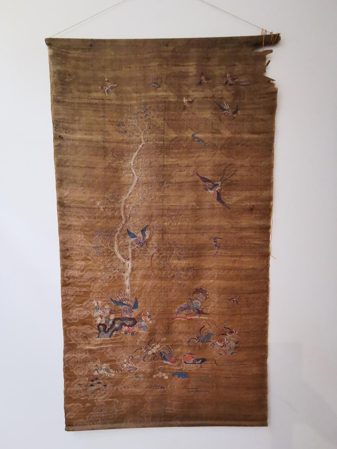 A Chinese 19th Chinese silk embroidered wall hanging decorated with a tree with birds and - Image 2 of 20