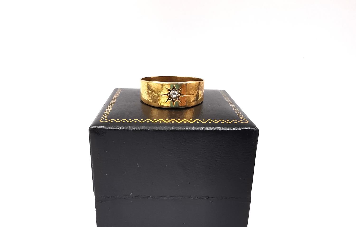 A Victorian 18ct yellow gold old mine diamond set band, set to centre with a round old cut diamond