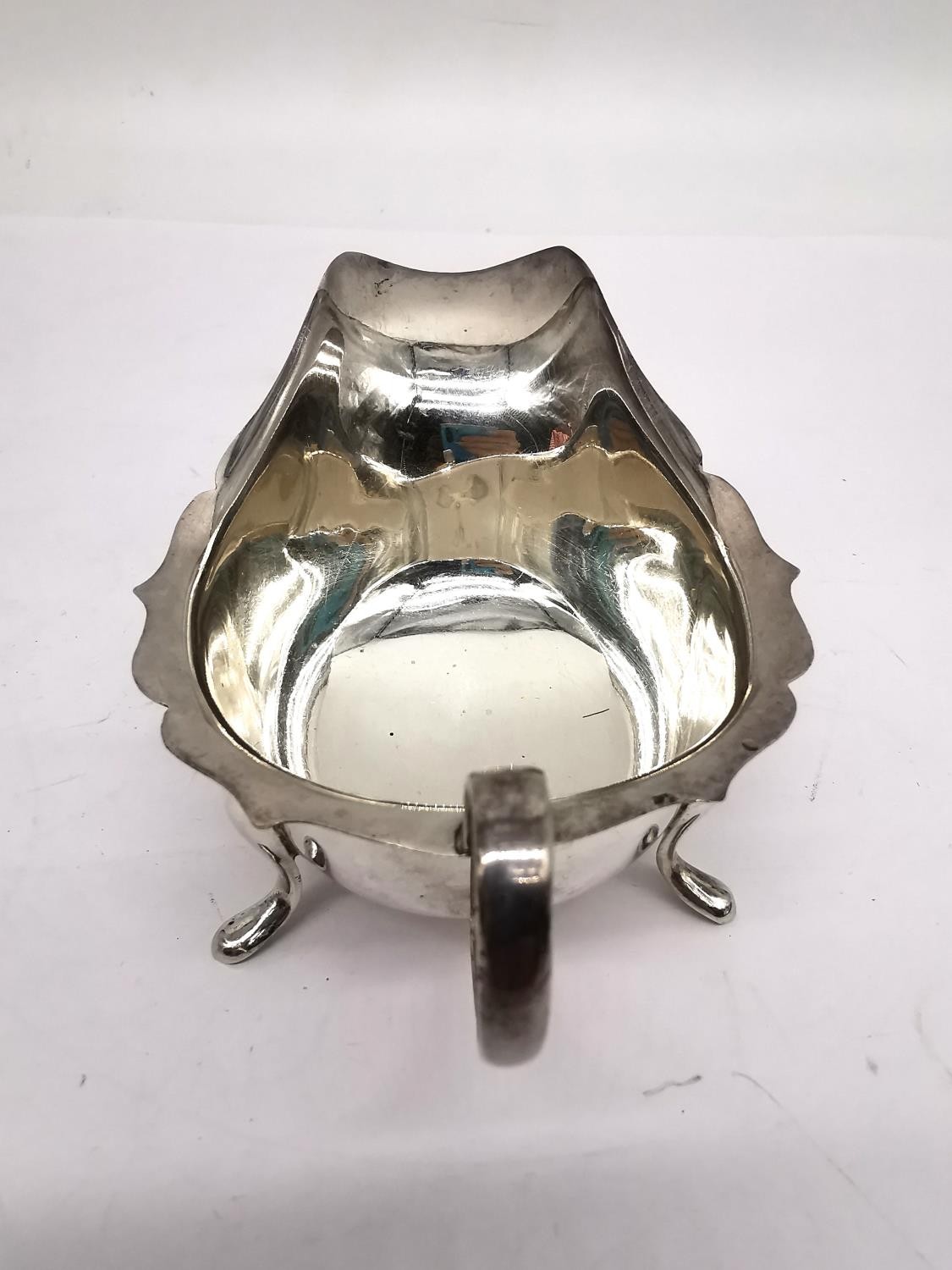 A silver gravy boat by Viners Ltd along with a sterling silver Victorian toast rack by James Dixon & - Image 7 of 8