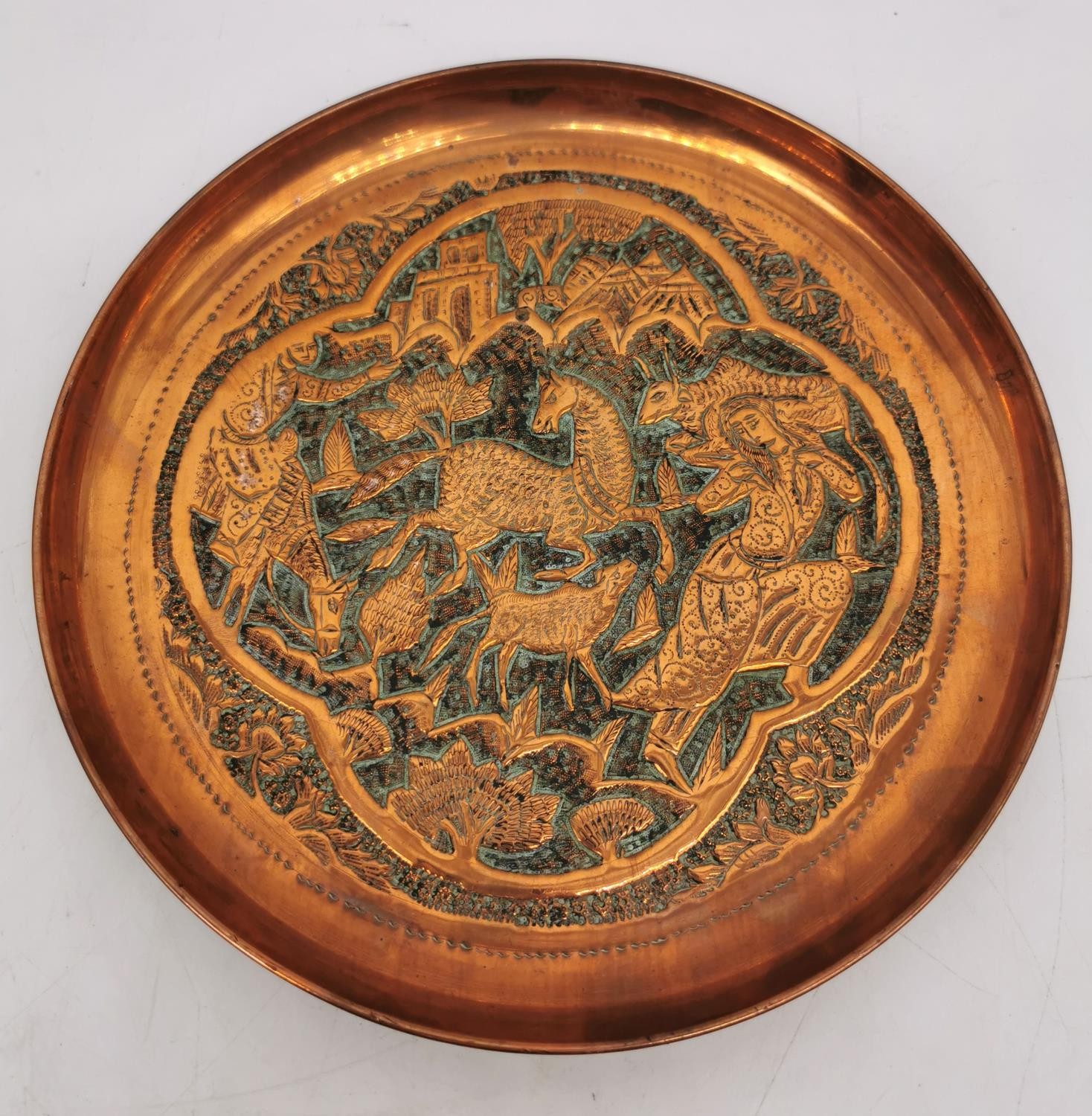 A collection of five early 20th century Persian copper repousse dishes, including a pair of coasters - Image 2 of 5