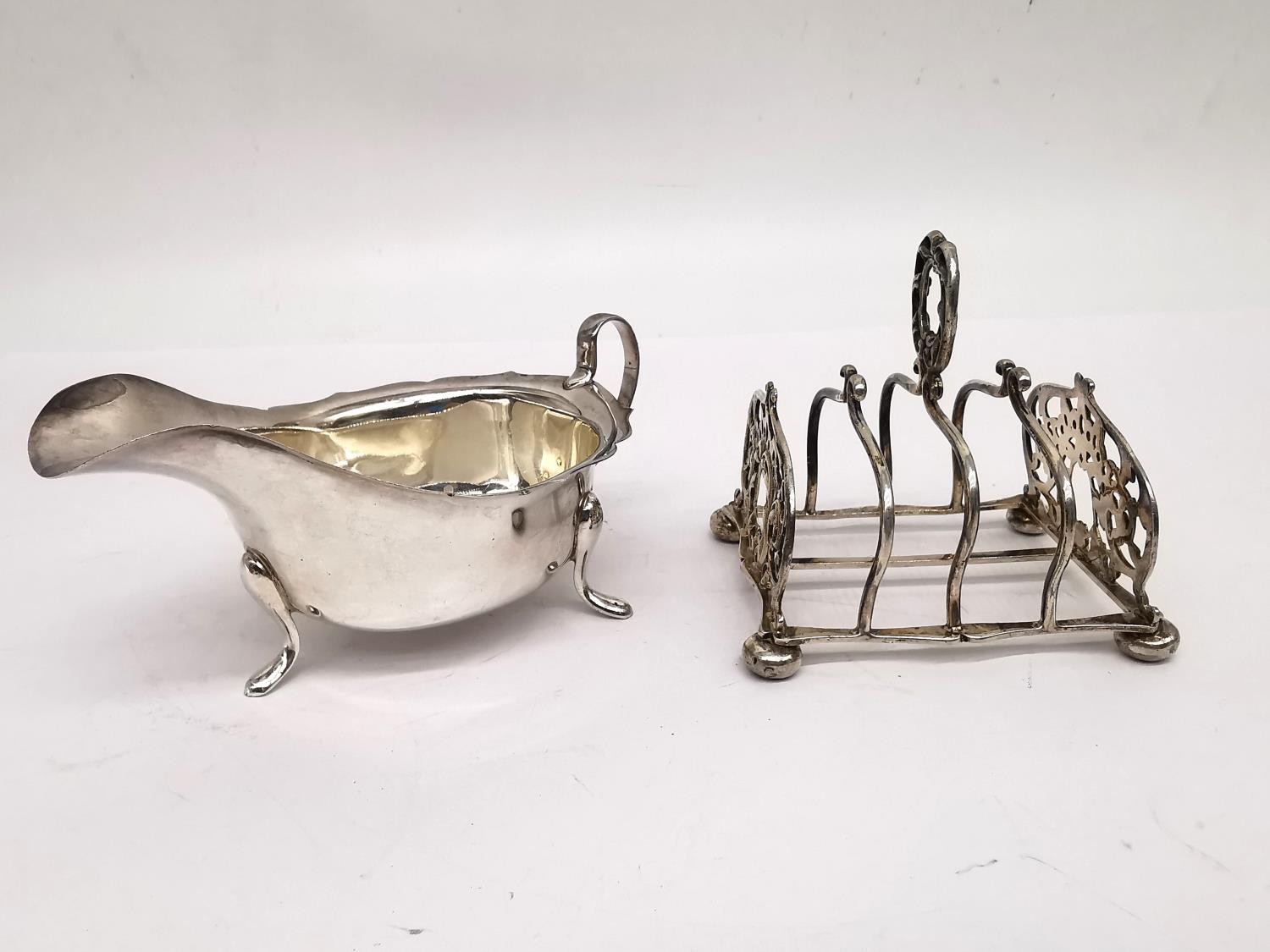 A silver gravy boat by Viners Ltd along with a sterling silver Victorian toast rack by James Dixon & - Image 2 of 8