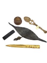 A miscellaneous collection of items to include an Indian brass spoon with cobra finial, an Art