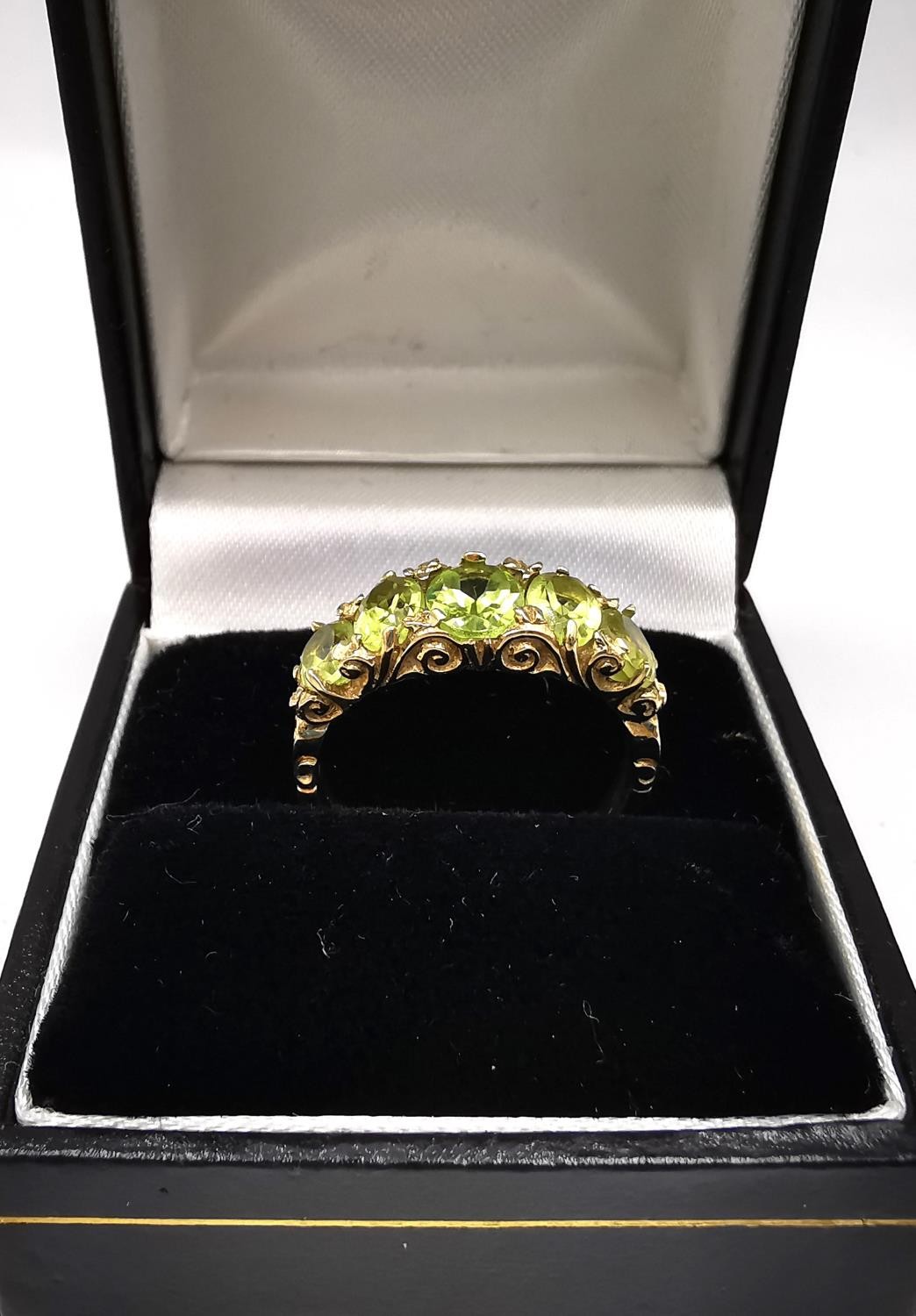 Three vintage 9ct yellow gold gem set rings, a Victorian style carved half hoop peridot set ring - Image 8 of 10