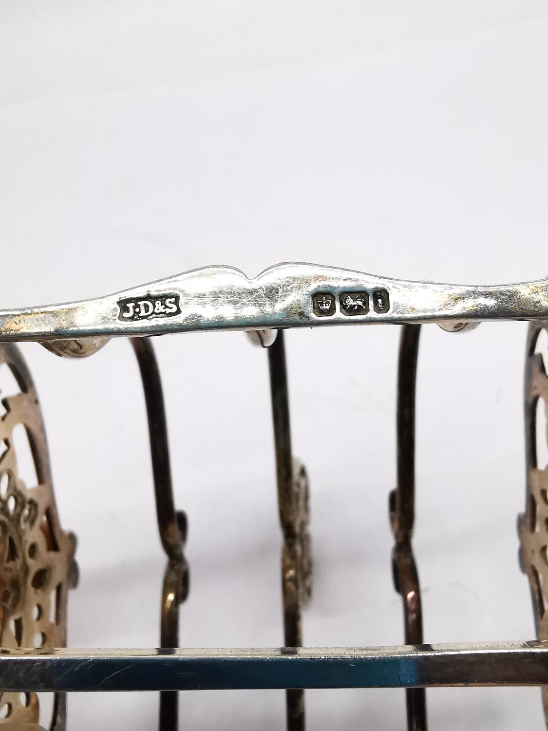 A silver gravy boat by Viners Ltd along with a sterling silver Victorian toast rack by James Dixon & - Image 4 of 8