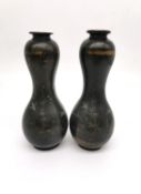A pair of 19th century bronze Japanese double gourde vases incised with prunus branches and inlaid