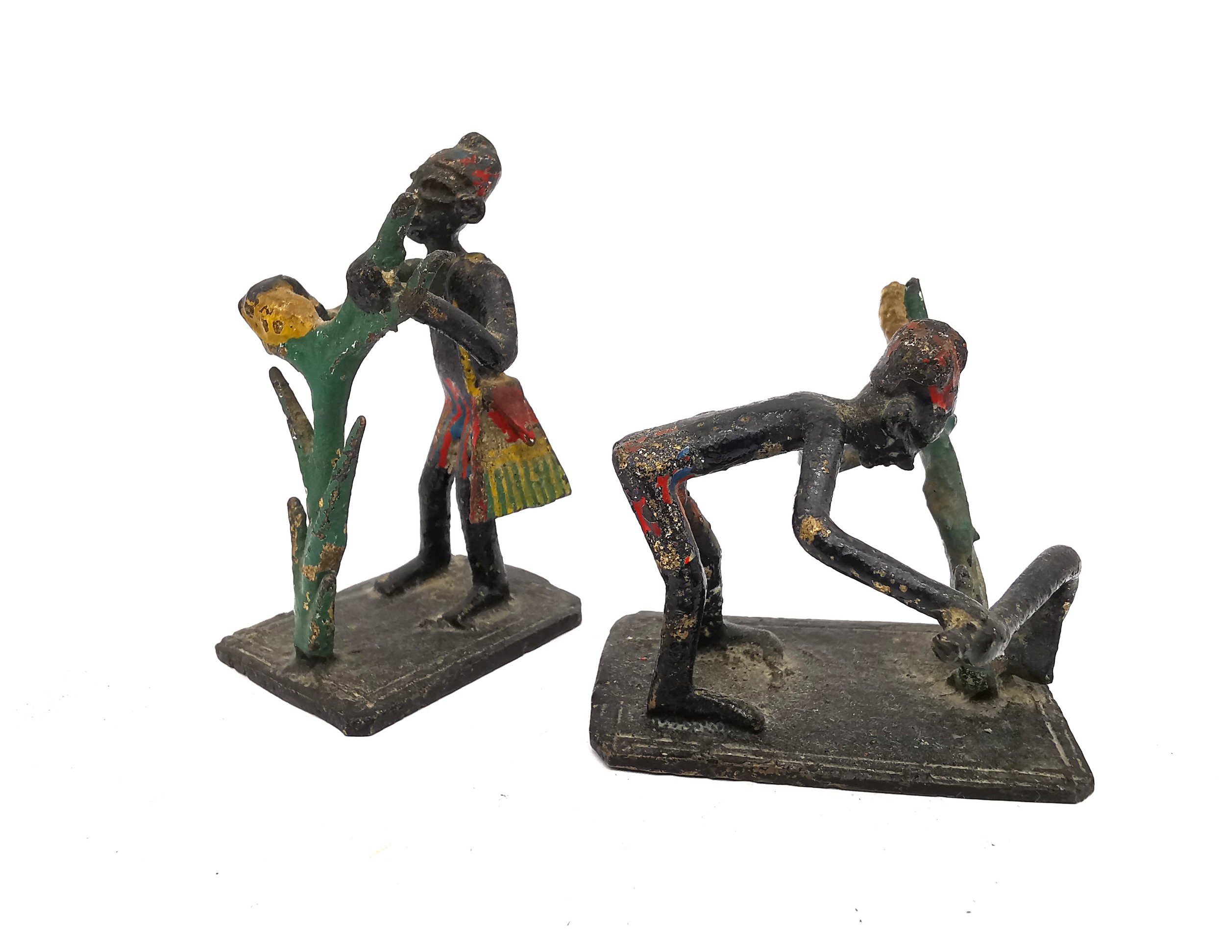 Seven miniature African tribal painted metal figures depicting various everyday activities. - Image 2 of 4