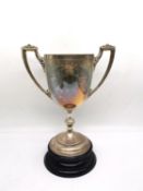 A large Victorian sterling silver golf trophy by Walker and Hall. Inscribed 'RAF 500 Guineas