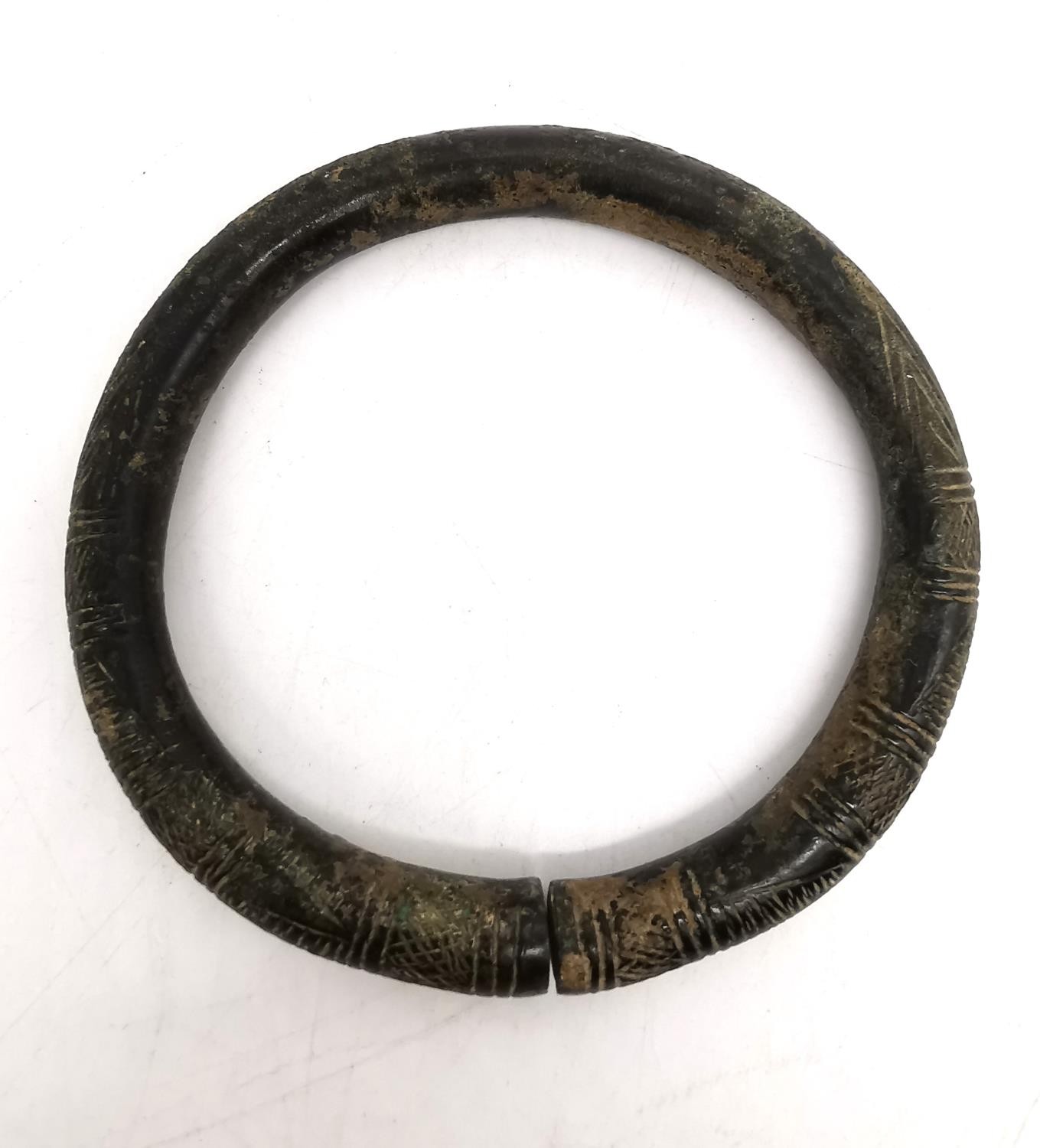 An ancient Iranian bronze torque arm bracelet/necklace with incised design. Diameter 12cm, - Image 6 of 6