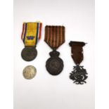 Three French medals and one coin, an Octroi medal of Merit, Bronze, a French St Helena campaign