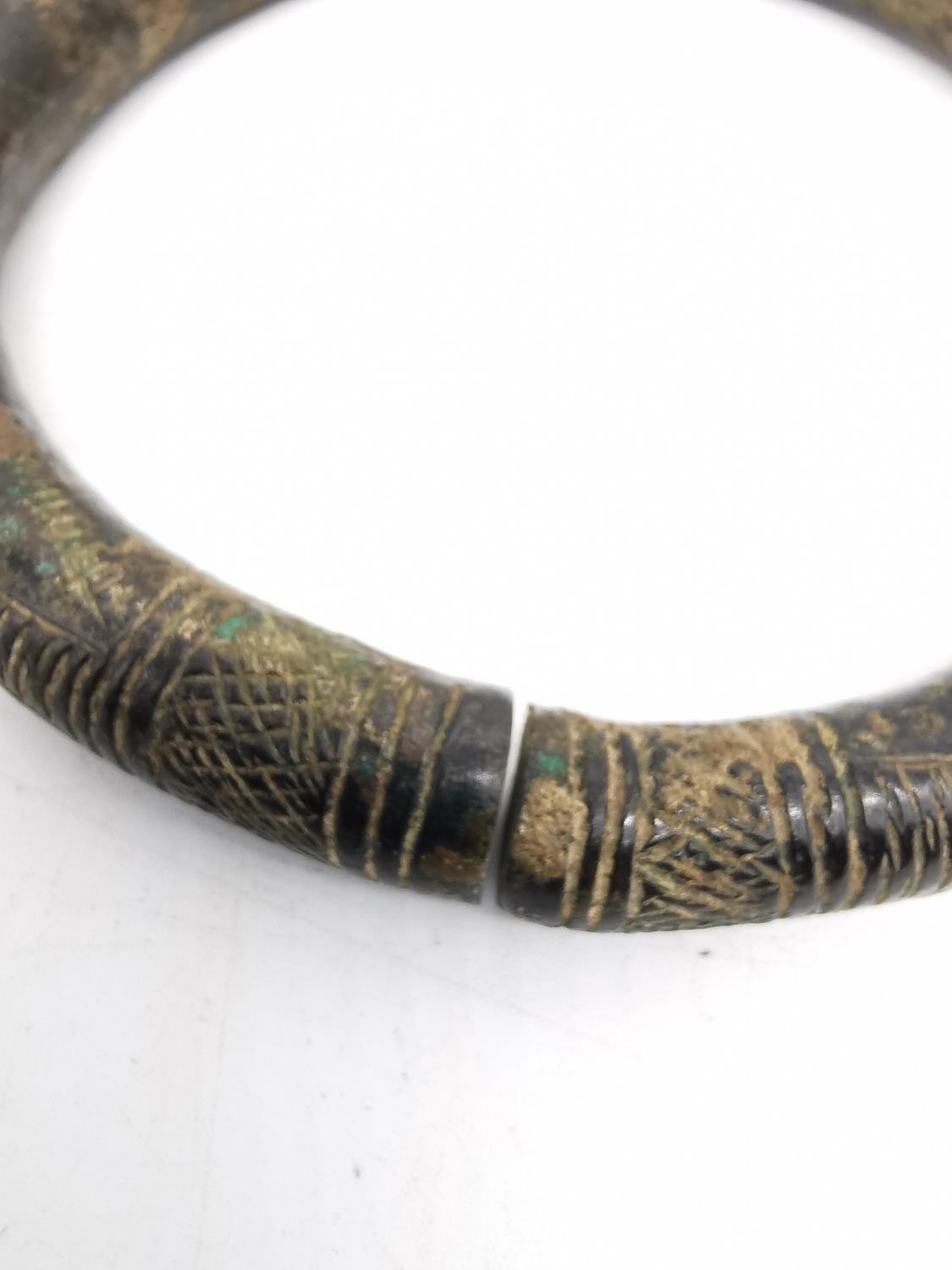 An ancient Iranian bronze torque arm bracelet/necklace with incised design. Diameter 12cm, - Image 4 of 6