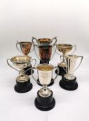 A collection of seven silver golfing competition trophies with inscriptions. Various makers. Tallest