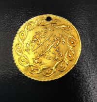 A Turkish 1 cedid gold coin, Mahmud II (1808-1839). (holed), Diameter 2cm. Weight 1.54g.