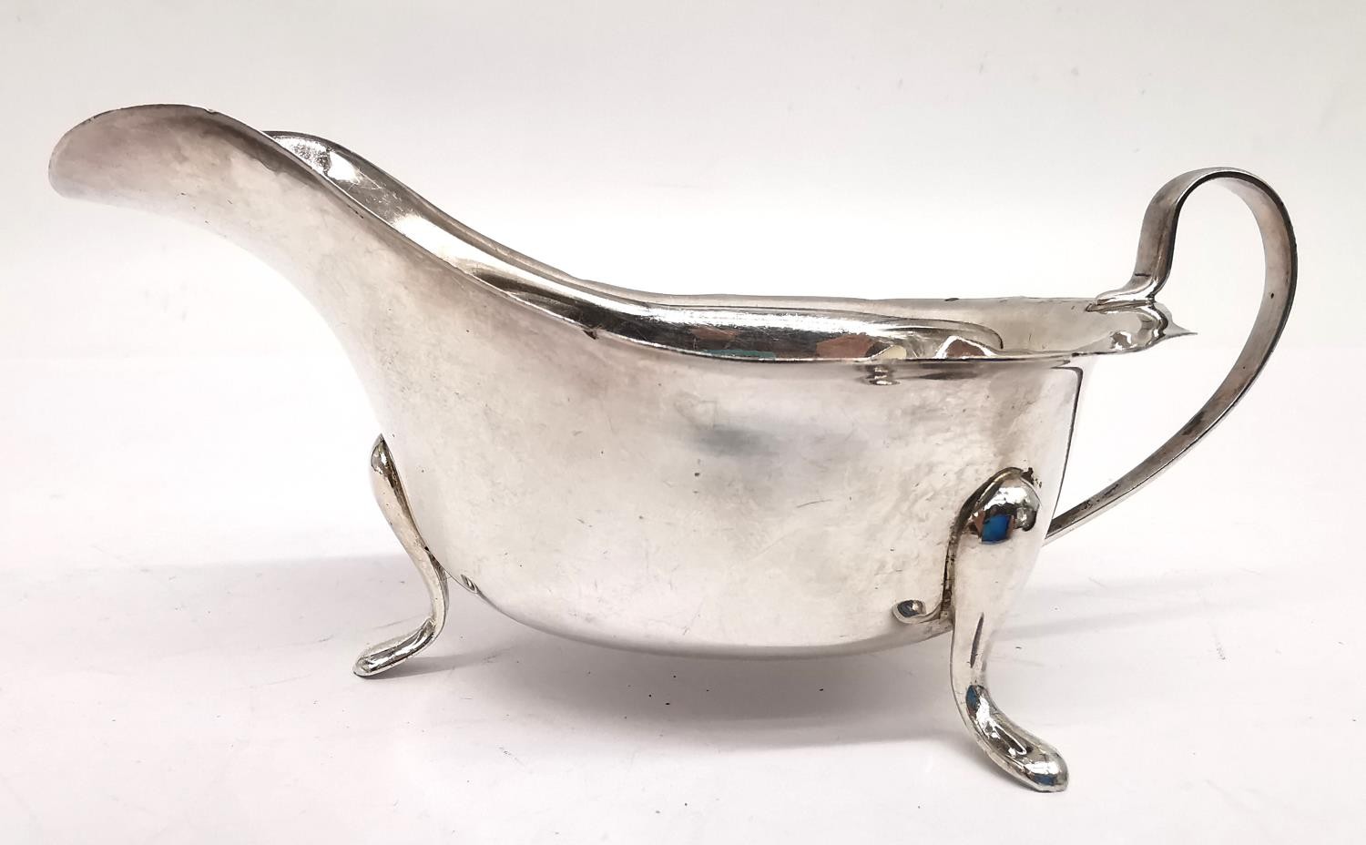 A silver gravy boat by Viners Ltd along with a sterling silver Victorian toast rack by James Dixon & - Image 6 of 8