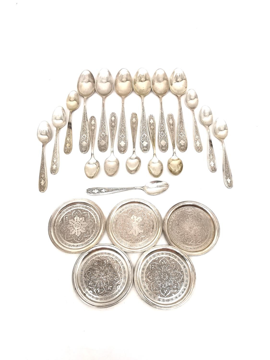 A collection of Persian engraved silver, including six silver teaspoon, twelve silver sauce spoons - Image 2 of 5