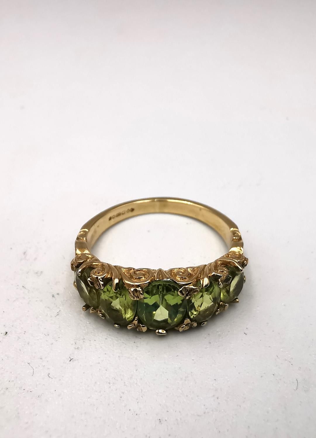 Three vintage 9ct yellow gold gem set rings, a Victorian style carved half hoop peridot set ring - Image 4 of 10