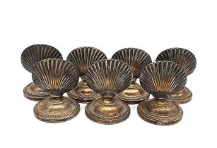 A set of seven early 20th century WMF silver plated scallop shell name place/menu holders. Makers