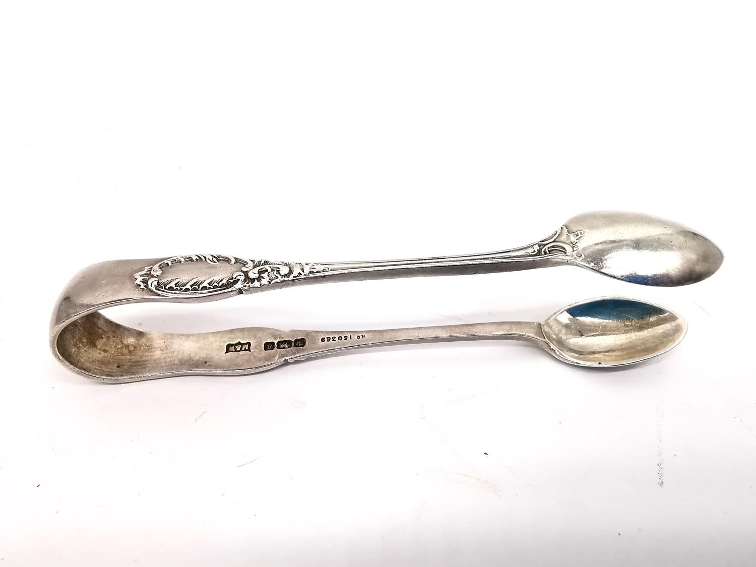 A collection of silver teaspoons, two pairs of sugar tongs, a pickle fork, a small sauce ladle and a - Image 7 of 16