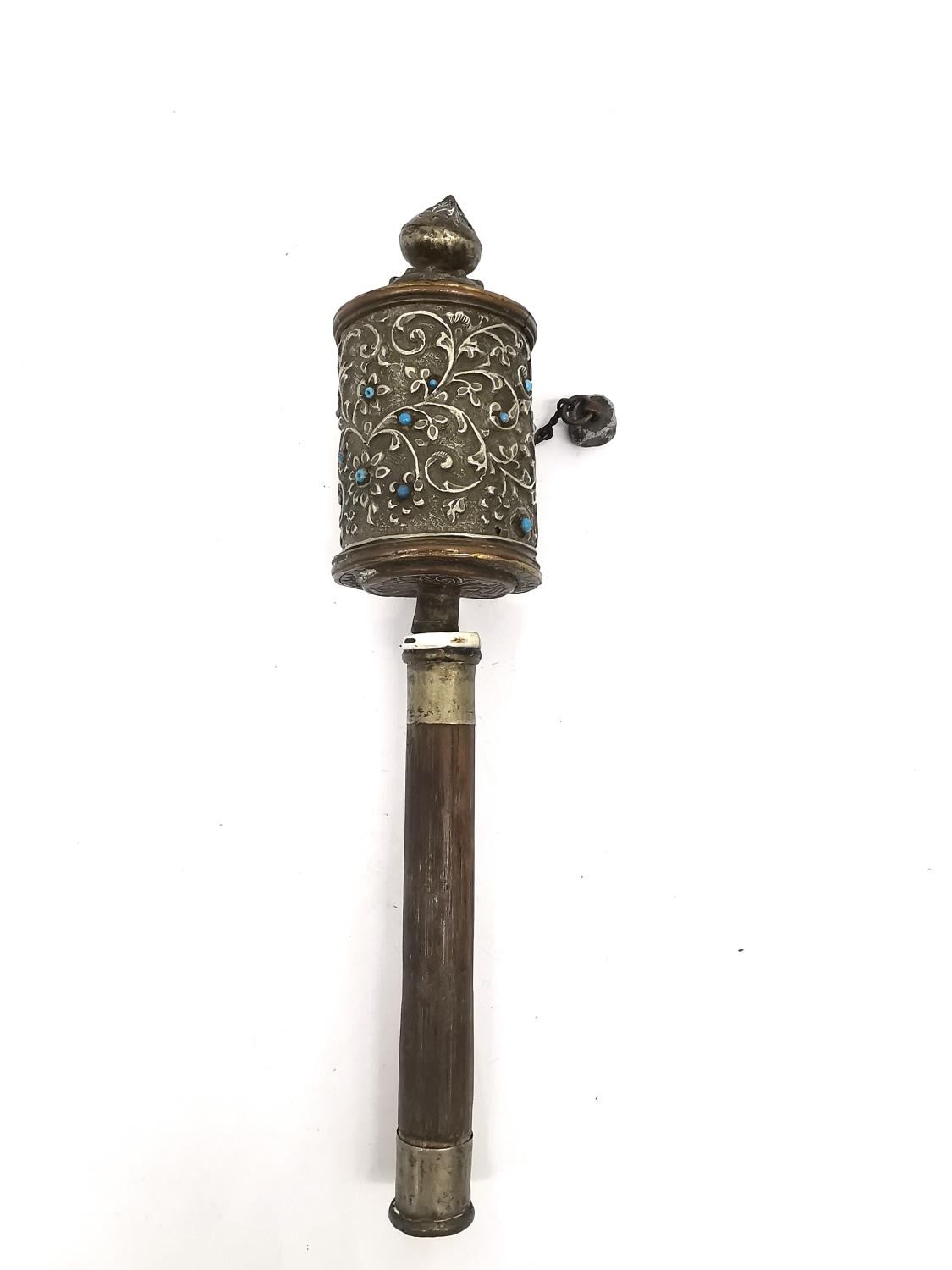 A Tibetan 19th century brass and copper repousse prayer wheel with hardwood handle. H.31cm. - Image 3 of 5