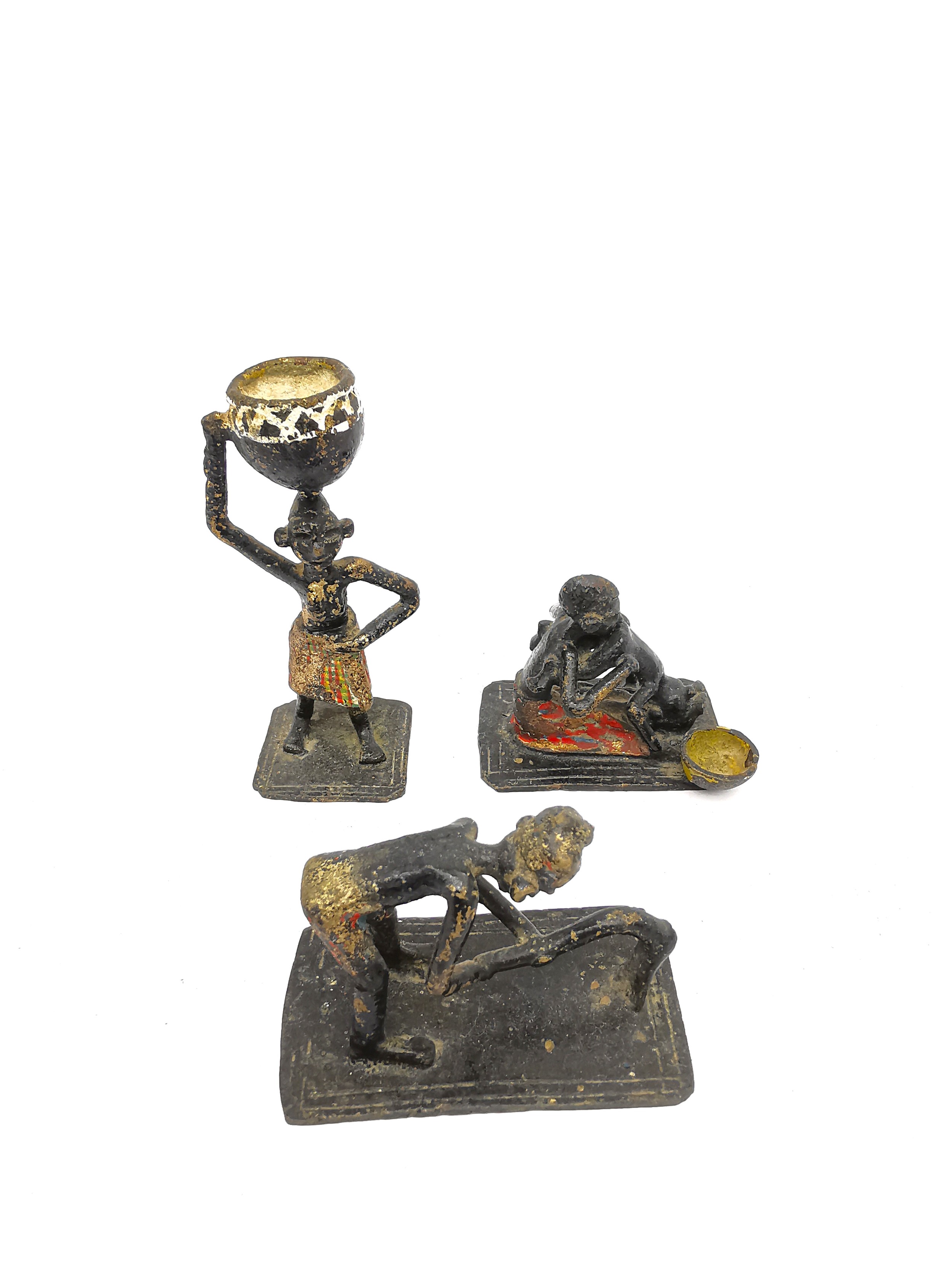 Seven miniature African tribal painted metal figures depicting various everyday activities. - Image 4 of 4