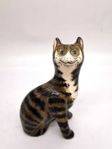 A hand painted G. Hill Wemyss striped cat, signed to base. H.18 L.11.5 D.7cm.