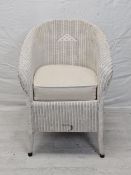 A vintage Lloyd Loom tub armchair.