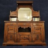 A late Victorian walnut sideboard. H.188 W.150 D.46cm.