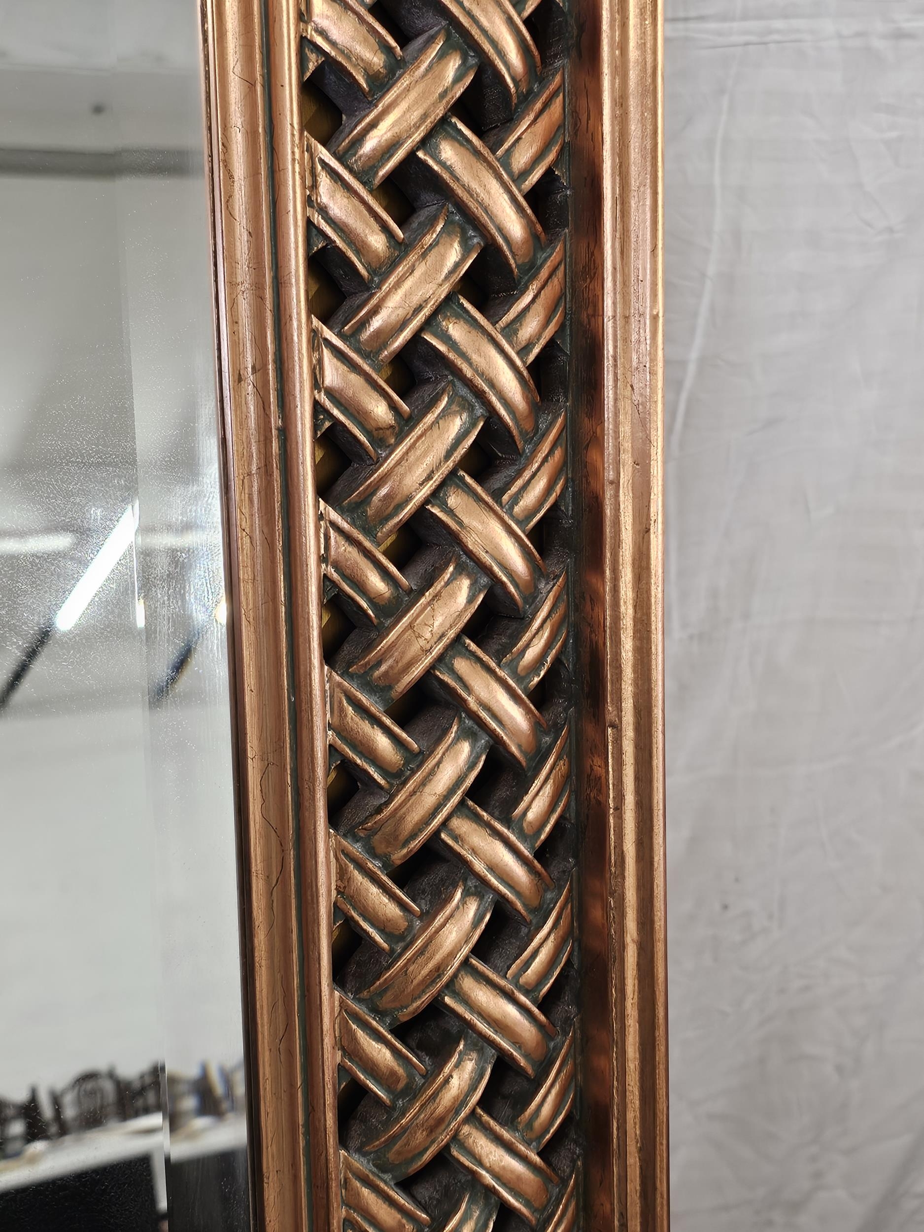 A contemporary carved and lacquered full height mirror. H.200 W.100cm. - Image 3 of 4