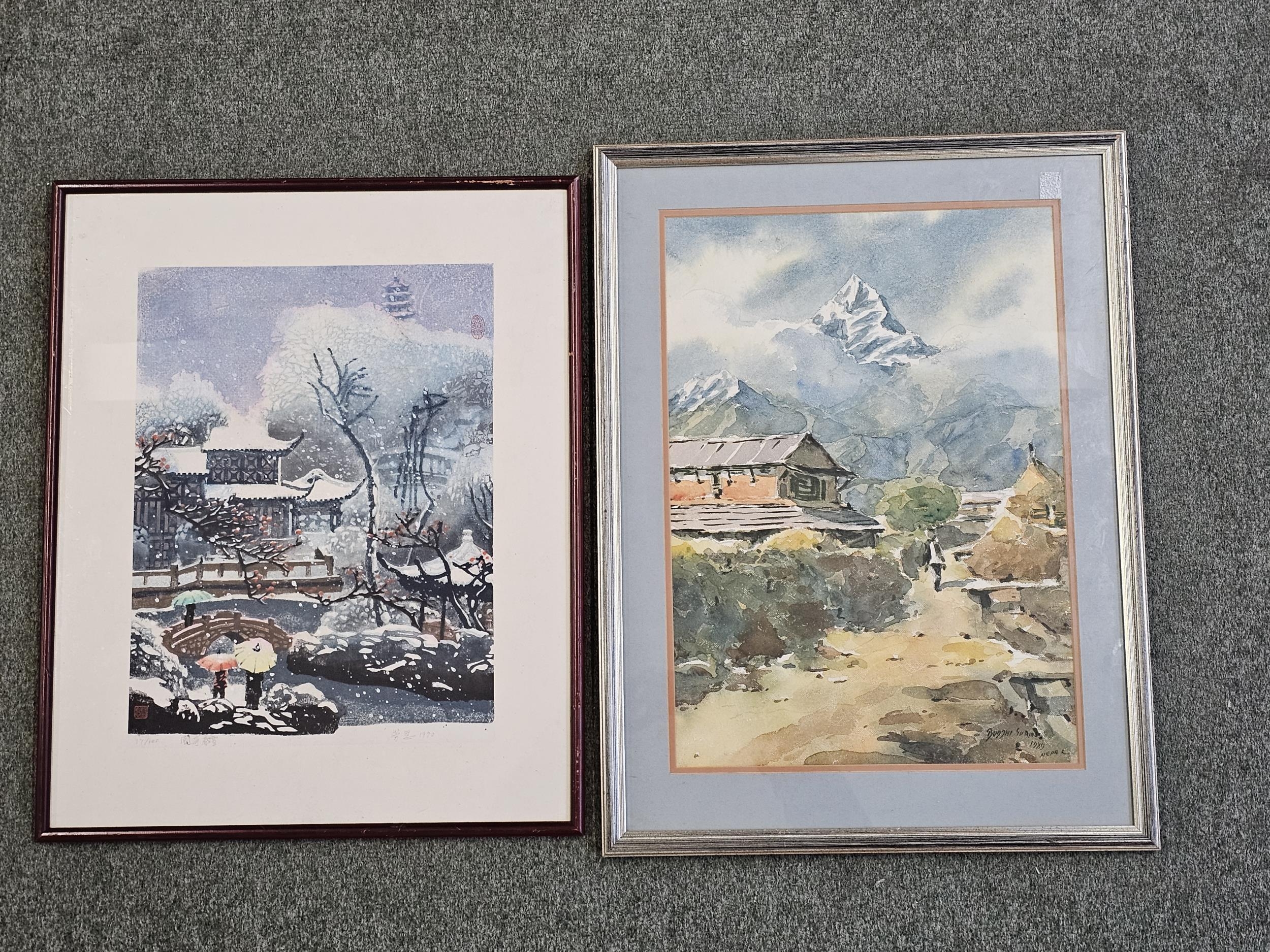 A framed and glazed watercolour, Eastern landscape and a similar signed and numbered etching.