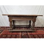 An 18th century continental elm side table with planked top on turned and stretchered base. H.78 W.