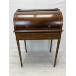 An Edwardian Sheraton style mahogany and satinwood inlaid cylinder bureau with fitted interior and