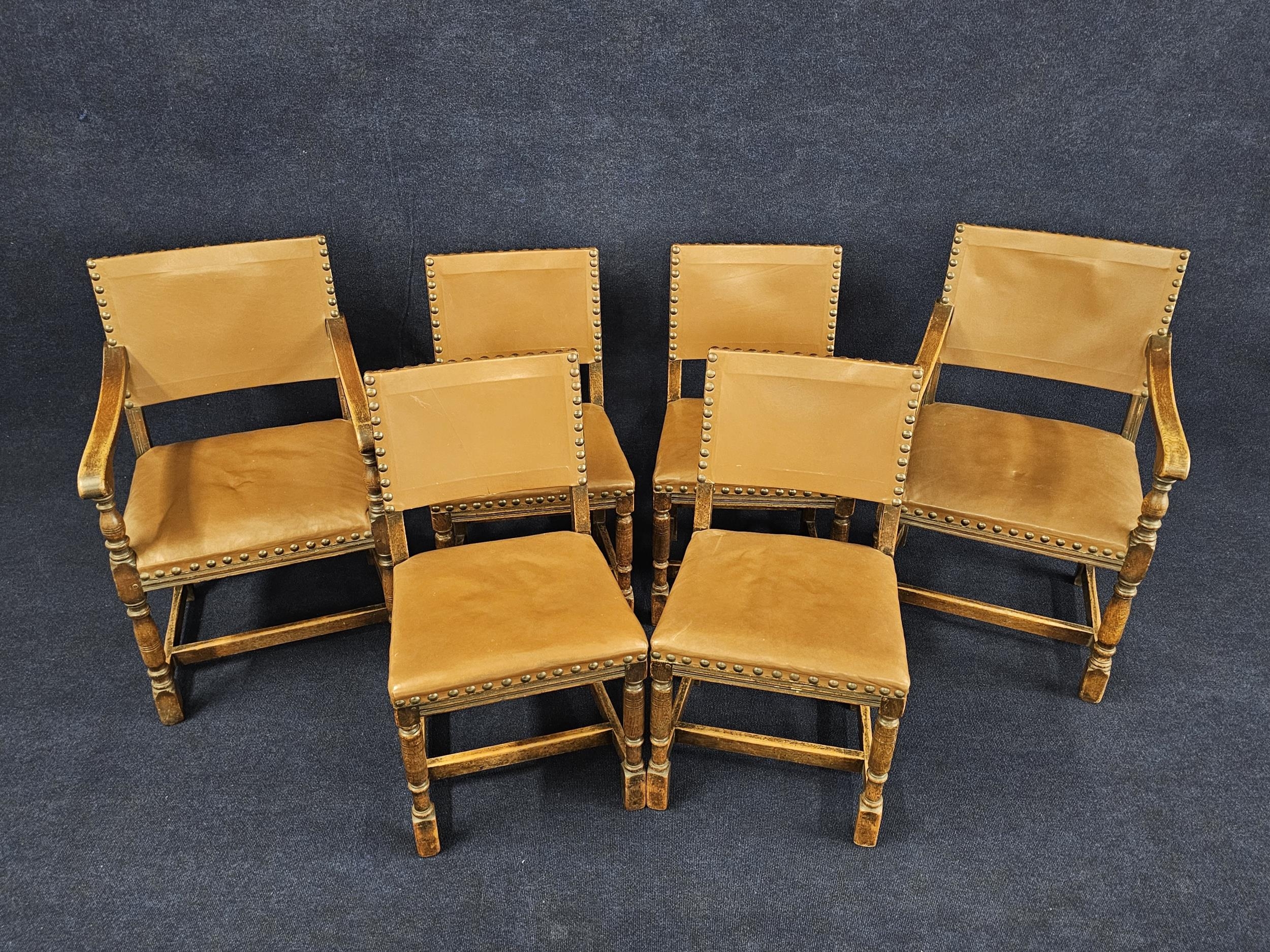 A set of six mid century oak framed dining chairs in the Jacobean style. Upholstered in leather to - Image 2 of 4