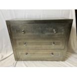 A contemporary metal bound chest of drawers. H.74 W.92 D.40cm.