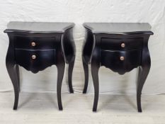 A pair of contemporary ebonised Continental style bedside chests. H.71 W.57 D.49cm.