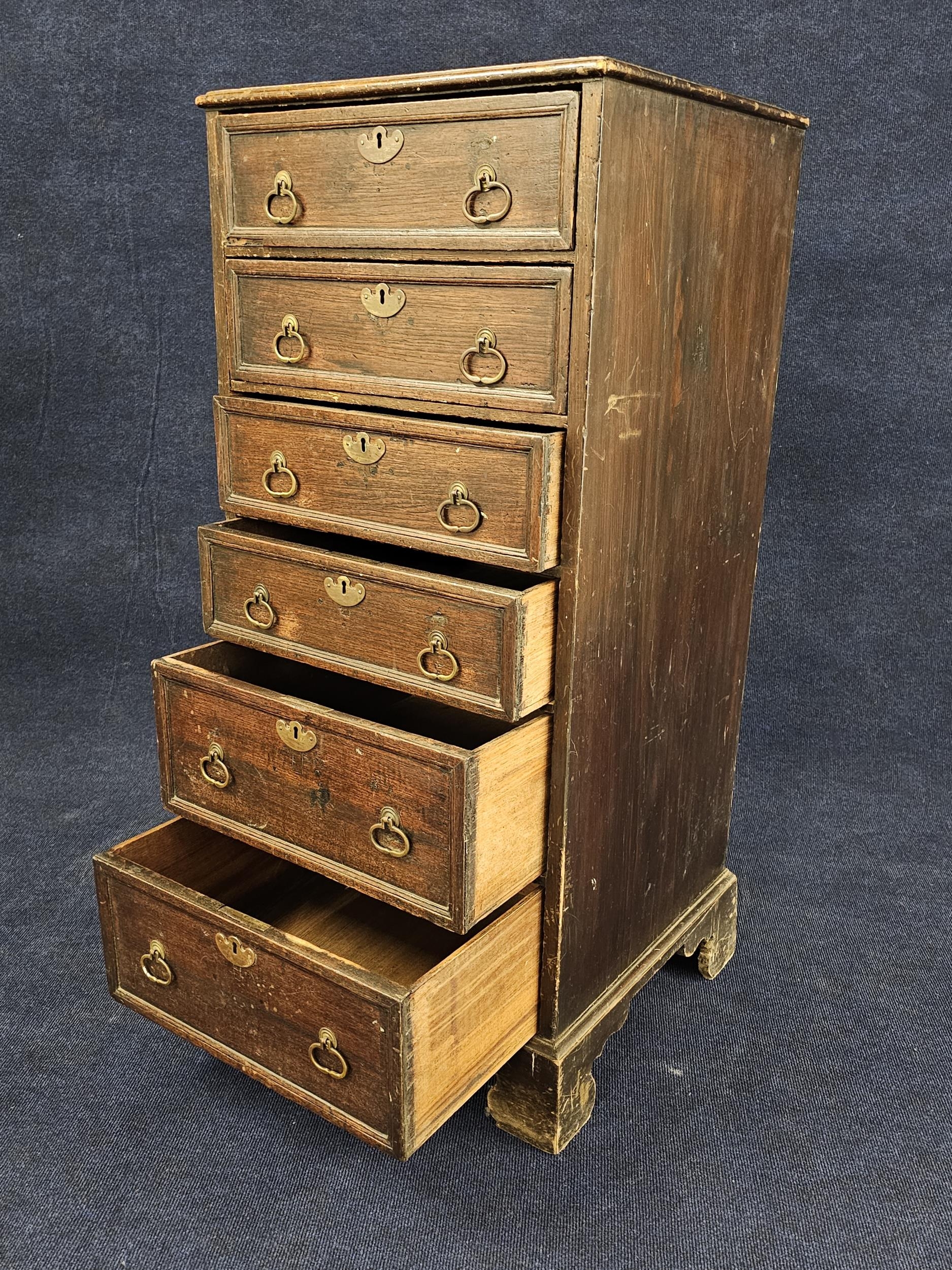 A Georgian country oak tallboy chest. H.120 W.53 D.53cm. - Image 3 of 4