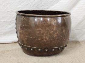 A 19th century riveted copper pot. H.30 Dia.45cm.