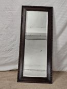 Wall mirror, mid century oak with bevelled plate. H.44 W.115cm.
