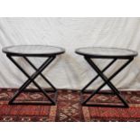 A pair of contemporary glass topped painted wood tables. H.60 W.70 D.70cm.