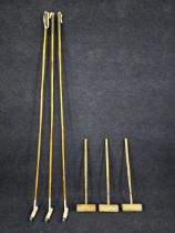 Three polo sticks and three croquet mallets. Polo sticks are L.228cm., Croquet mallets are L.88cm.